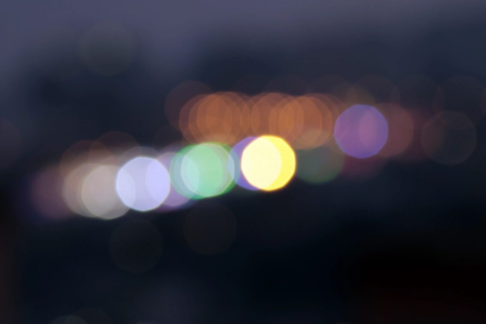A blurry image of lights in the dark.